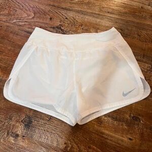 white nike running shorts